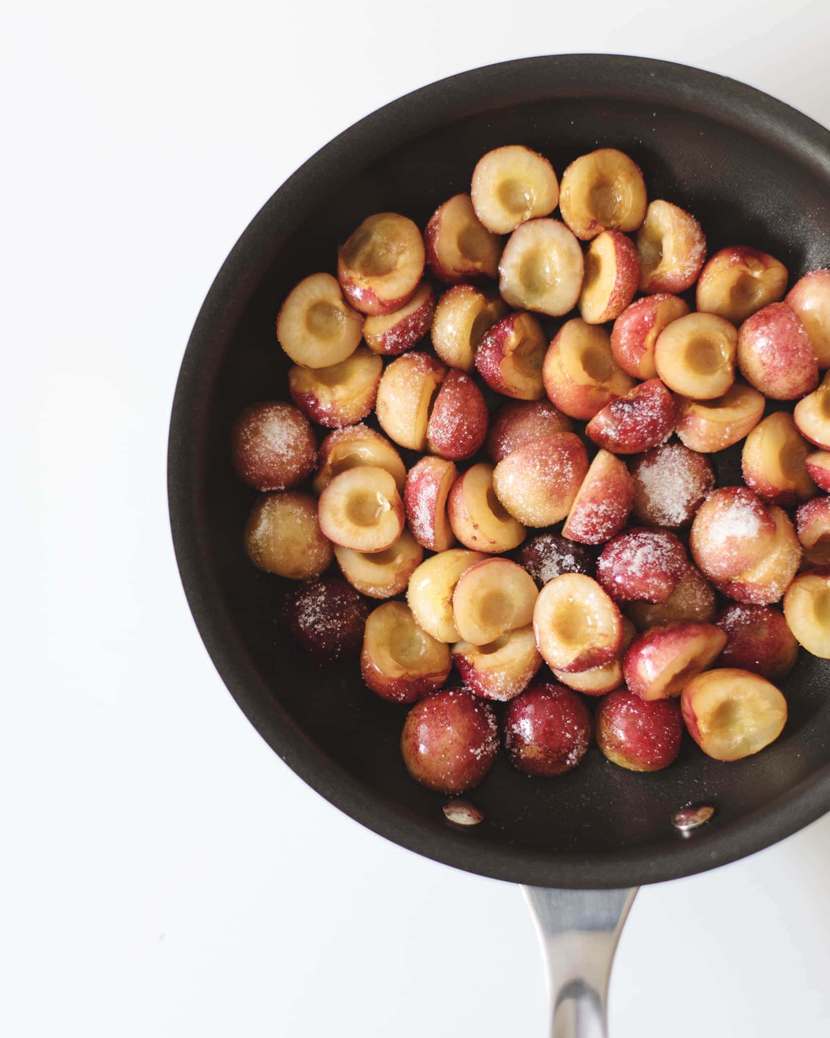 Pan of Rainier cherries covered with sugar
