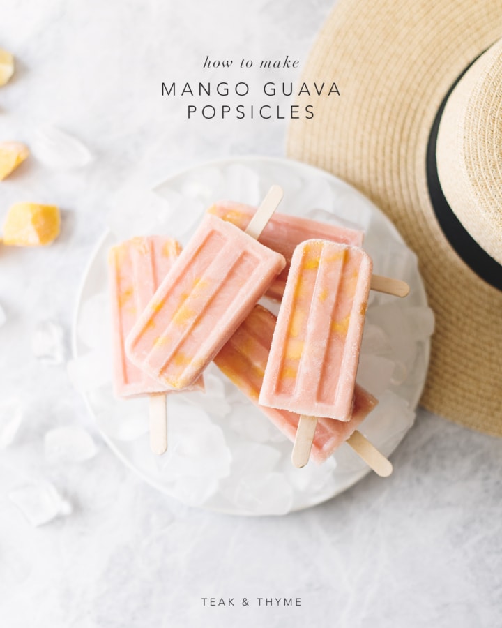 Stack of mango guava popsicles on top of plate of ice next to straw hat