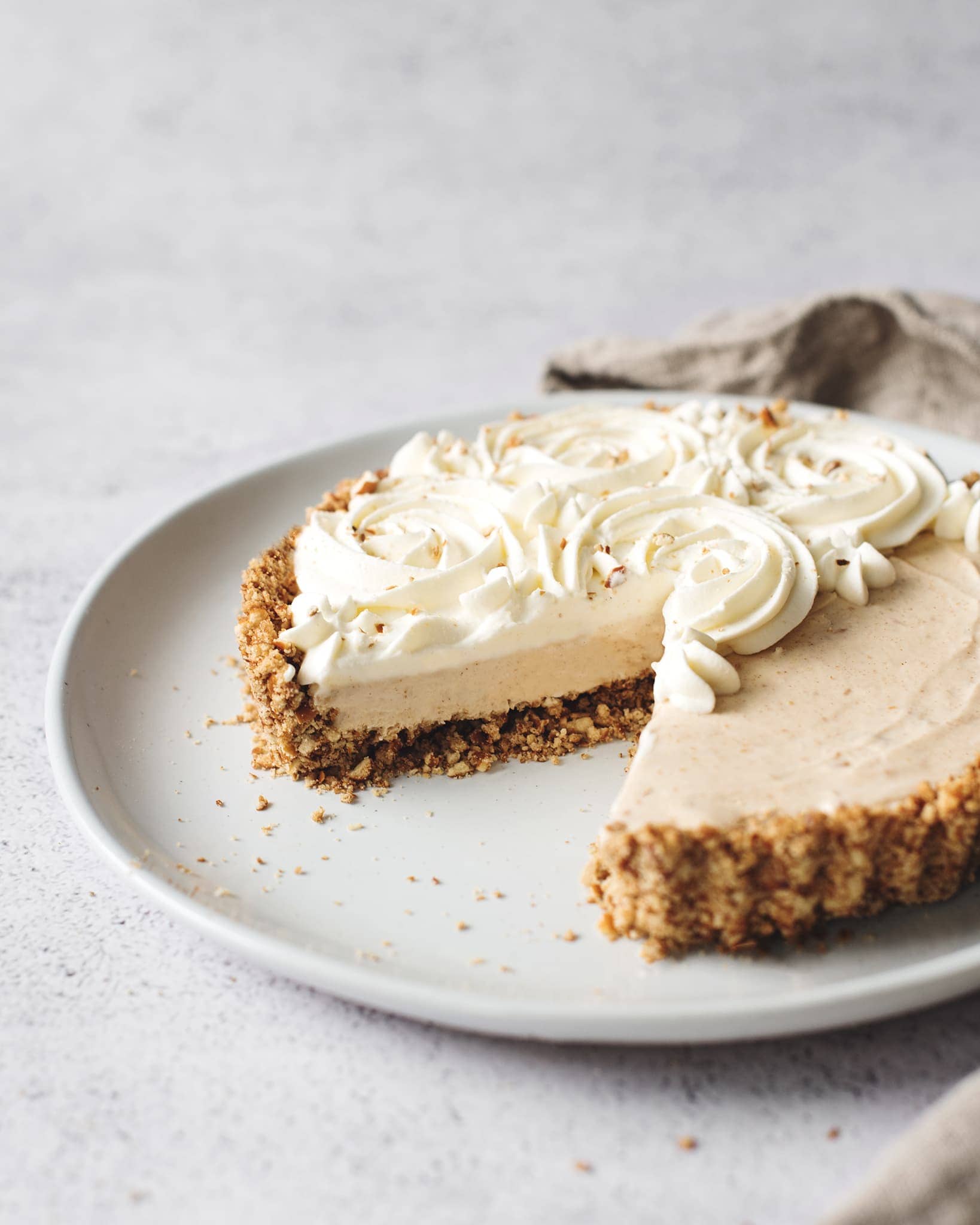 Close up of cut edge of pie to show ice cream layers