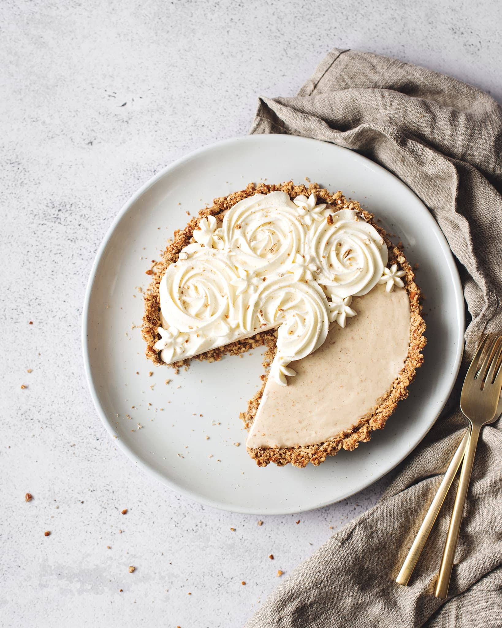 An ice cream pie with a slice missing