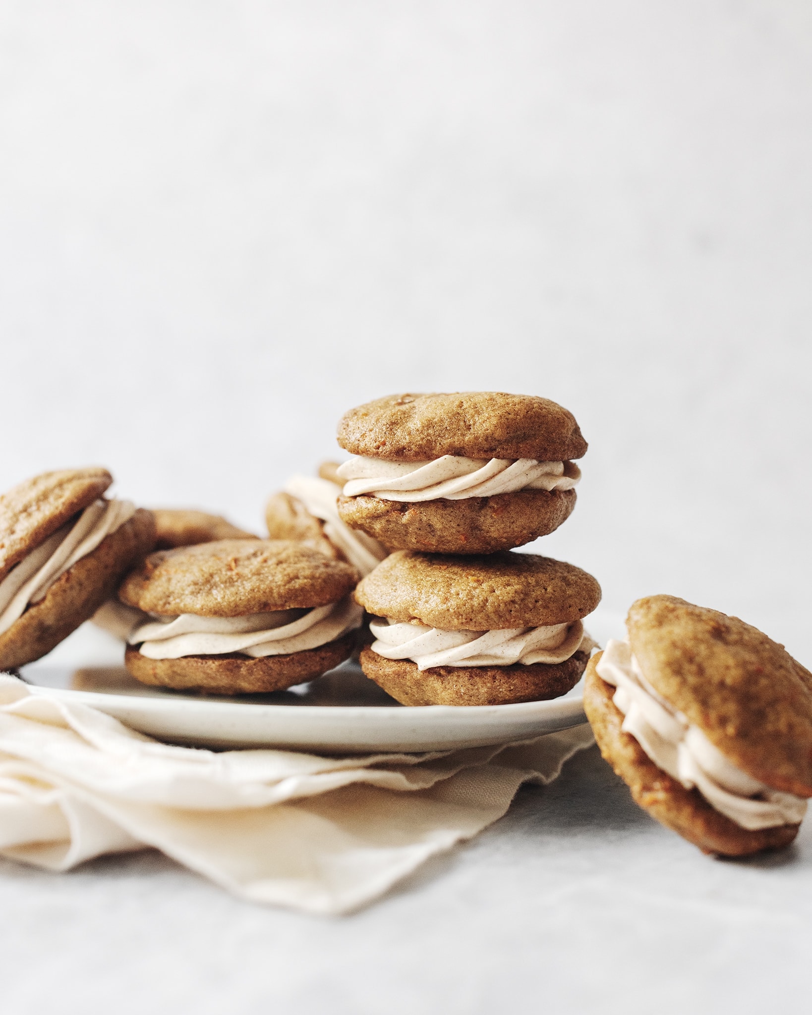 A stack of carrot cake whoopie pies