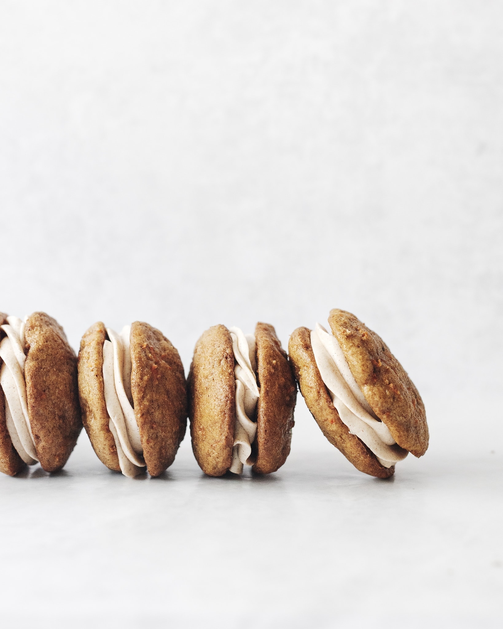 A row of carrot cake whoopie pies