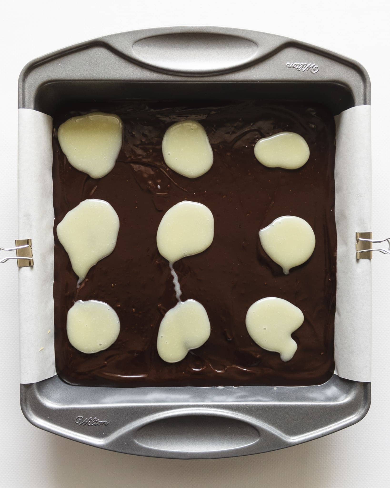 White chocolate on dark chocolate ganache