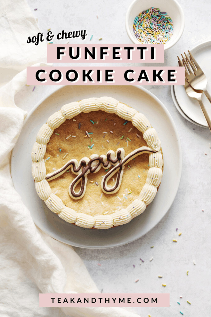 Cookie cake with the word "yay" piped in buttercream