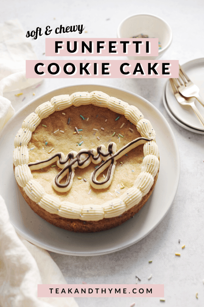 Cookie cake with the word "yay" piped in buttercream