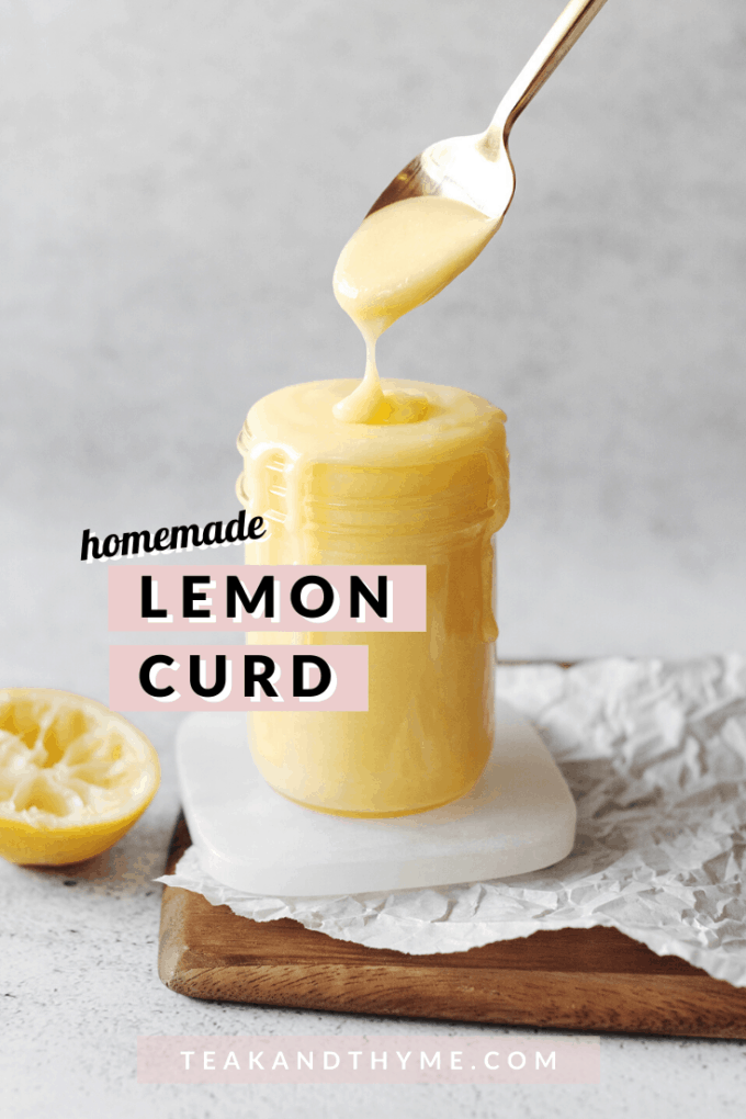 Spoon dripping lemon curd into glass jar