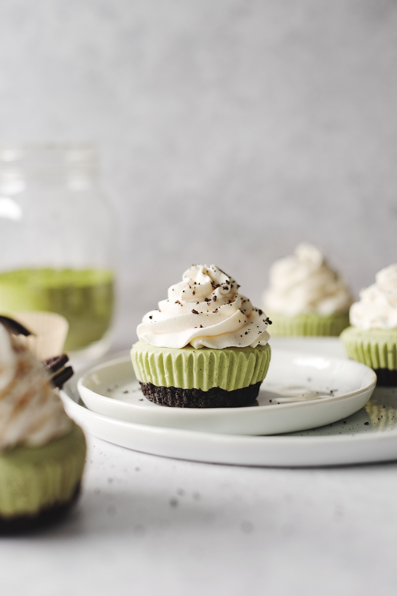 No-bake matcha cheesecake topped with whipped cream