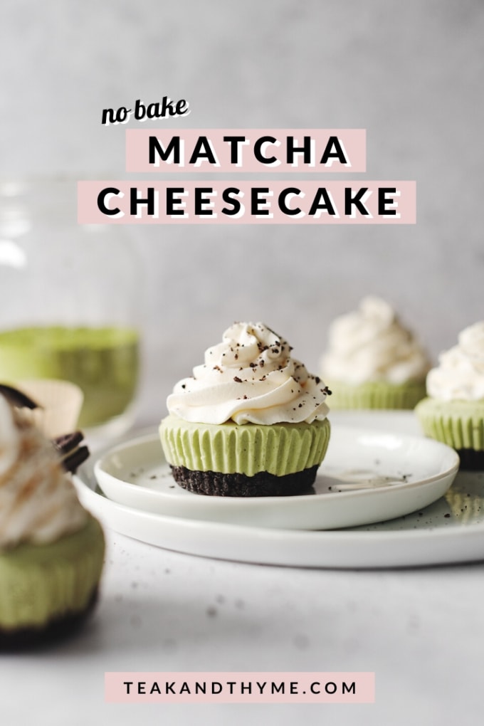 Matcha cheesecake topped with whipped cream on plate