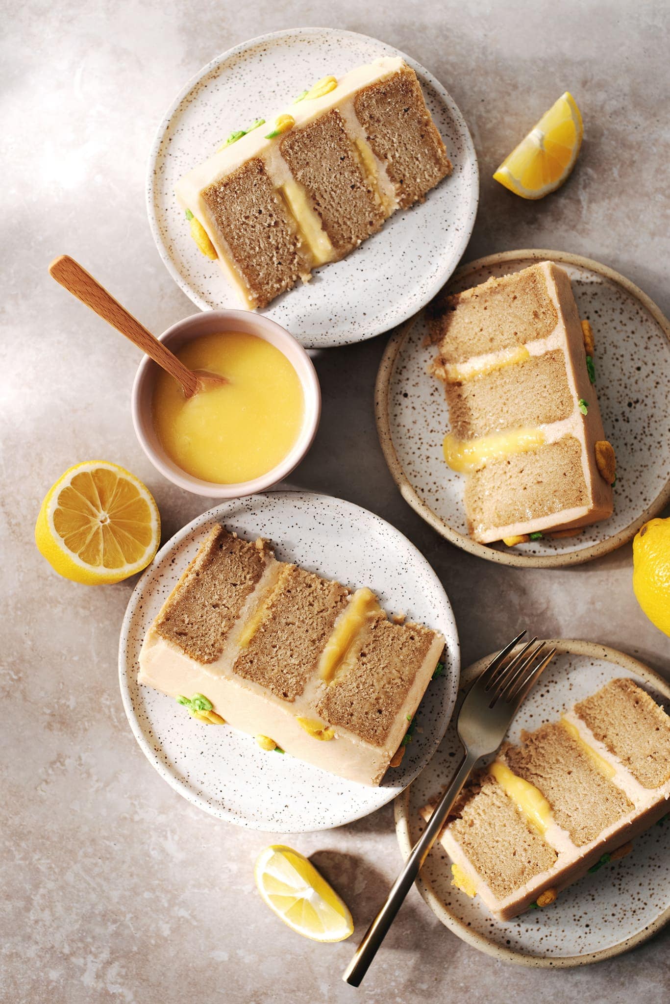 Slices of earl grey lemon cake on plates