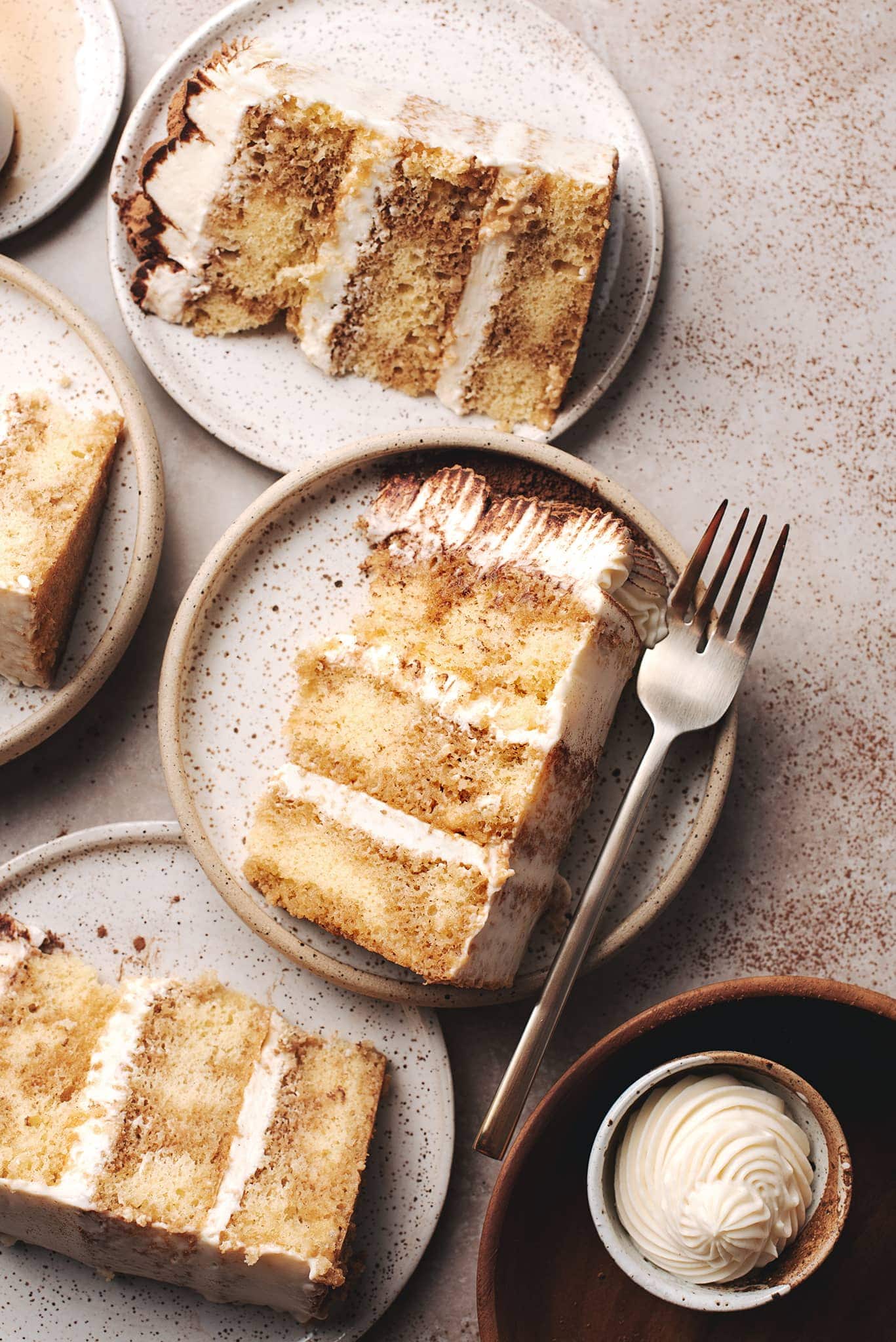 Tiramisu cake layers on small plates