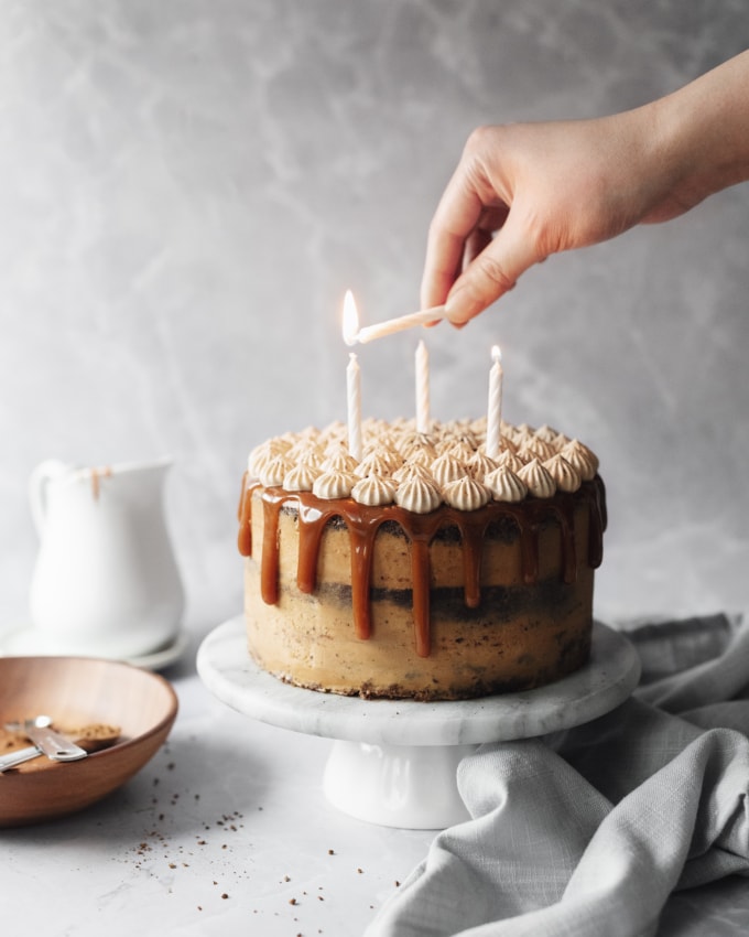 Lighting candles on a cake