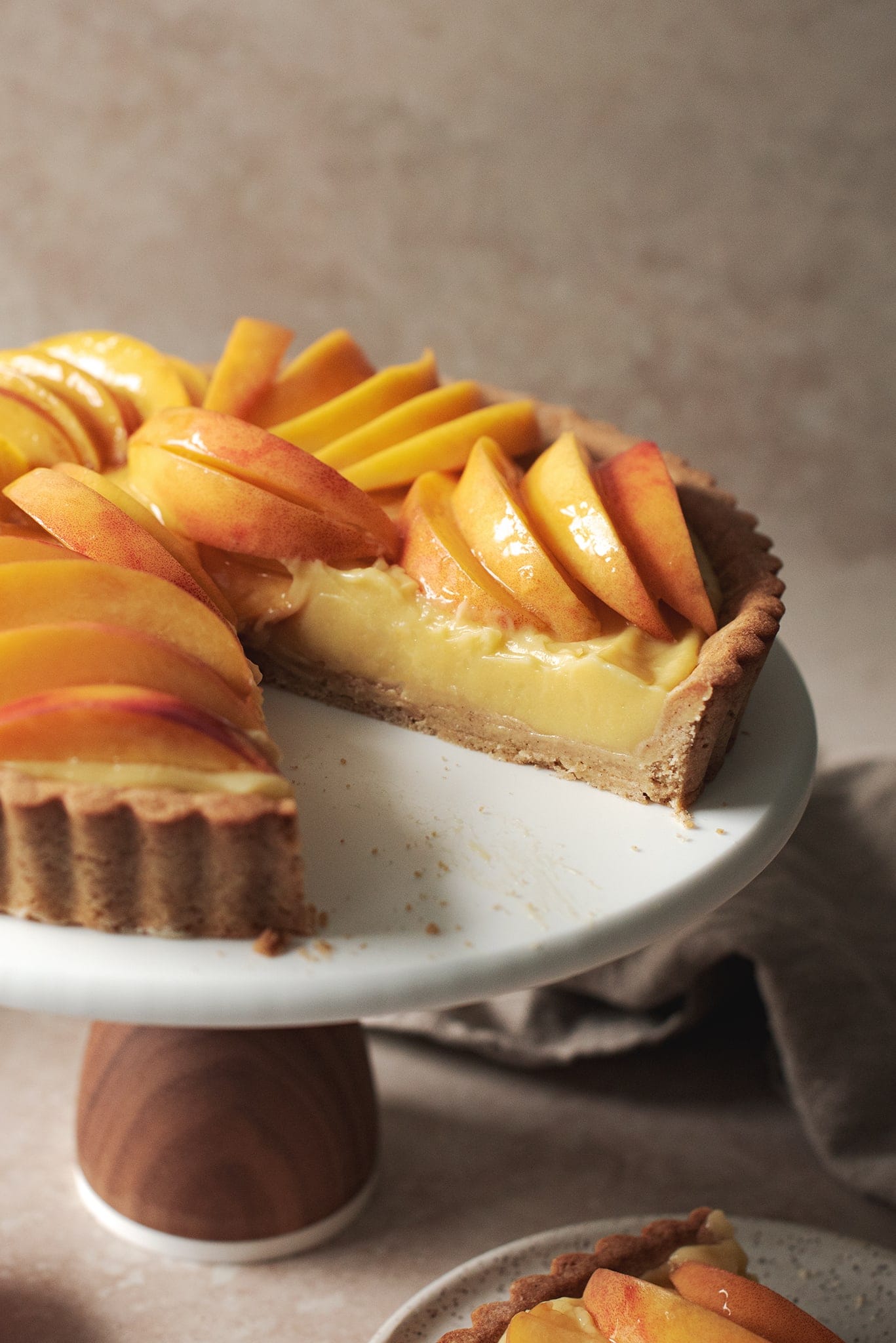 Custard pastry cream filling in a peach tart