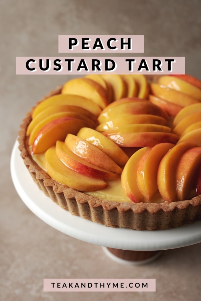 Slices of fresh peaches on top of custard tart