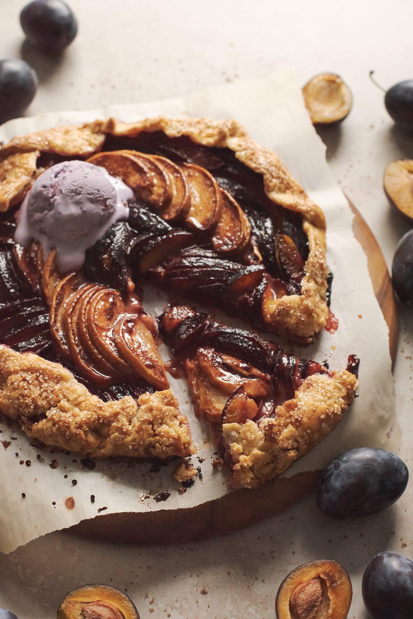Slice cut from a peach plum galette