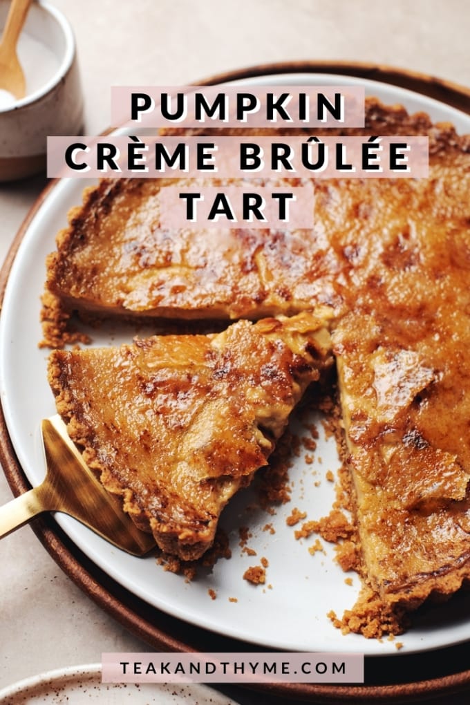 pumpkin crème brûlée tart with a slice cut out of it