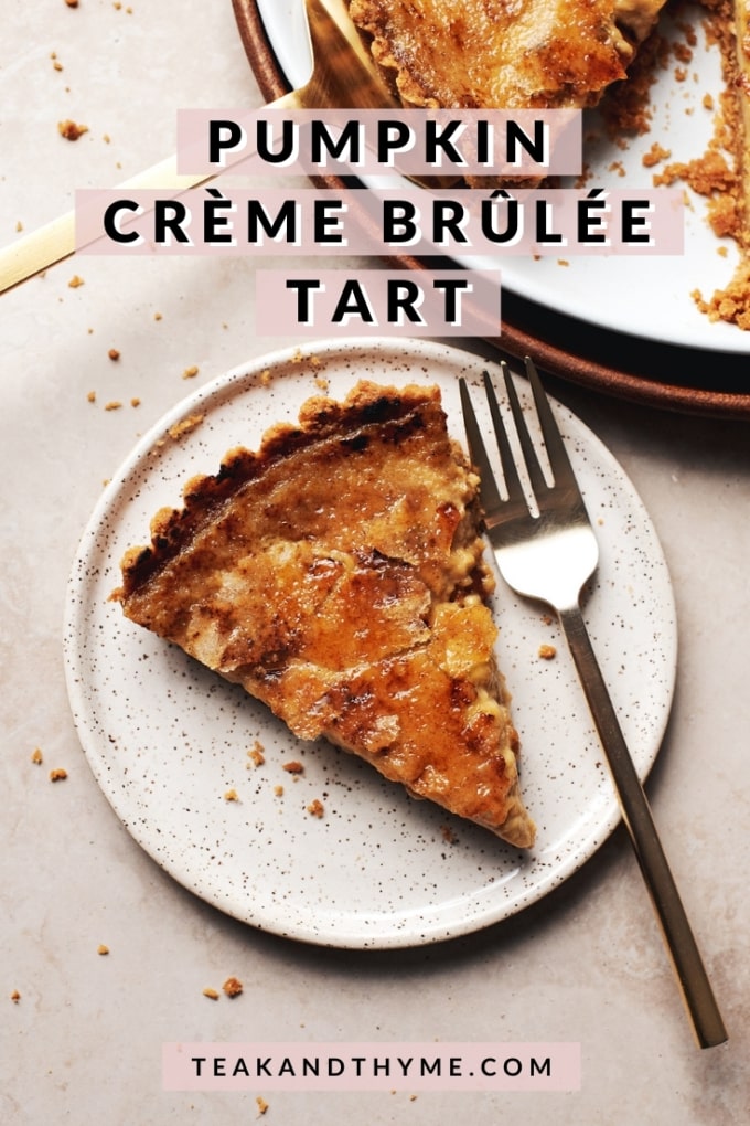 slice of pumpkin crème brûlée tart on a plate with fork
