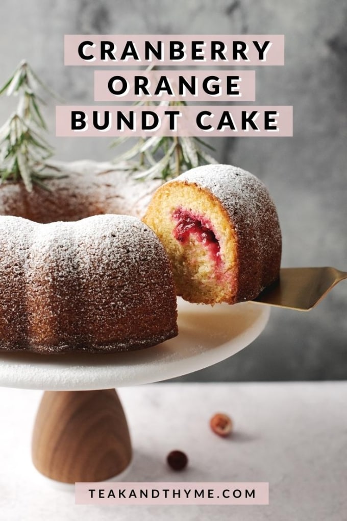 a slice of cranberry orange bundt cake lifted by cake server