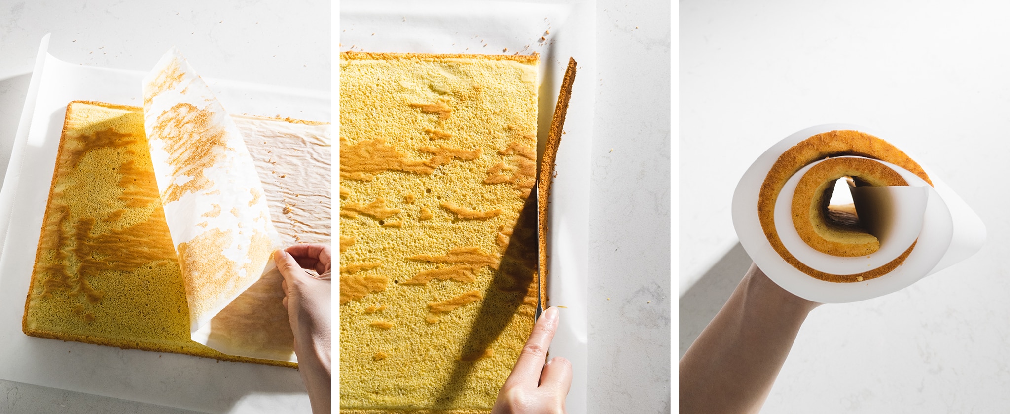 rolling up baked sponge cake into a log