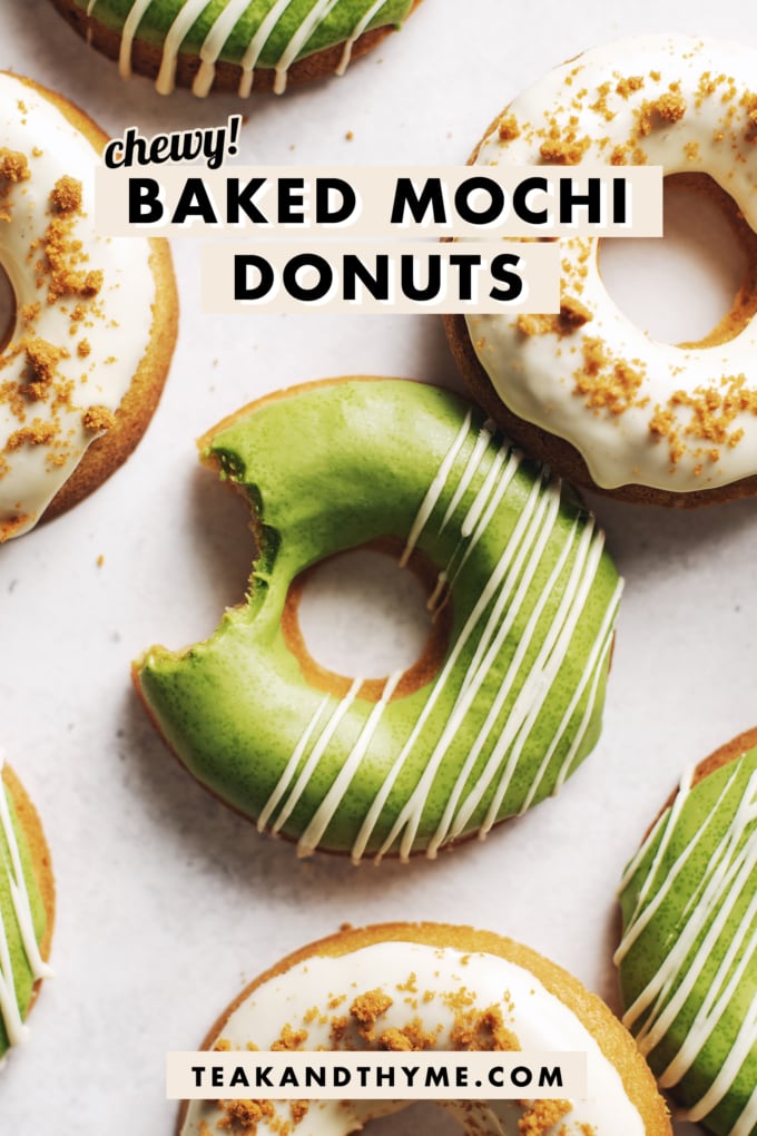 A bite taken out of a matcha mochi donut.