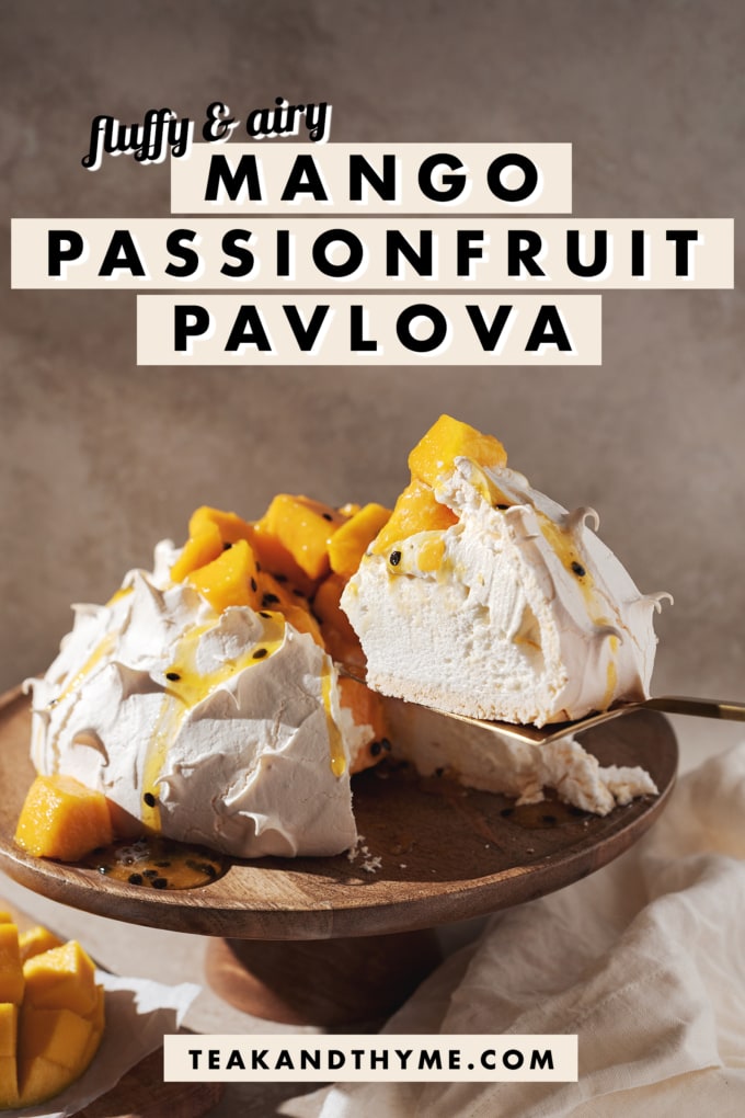 lifting a slice out of mango passionfruit pavlova