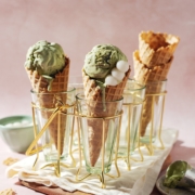 two scoops of matcha ice cream in waffle cones