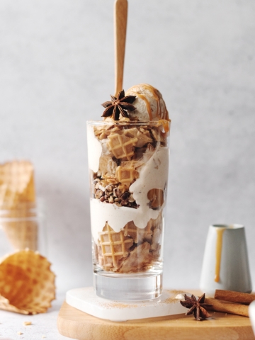 Ice cream parfait with a wooden spoon sticking out
