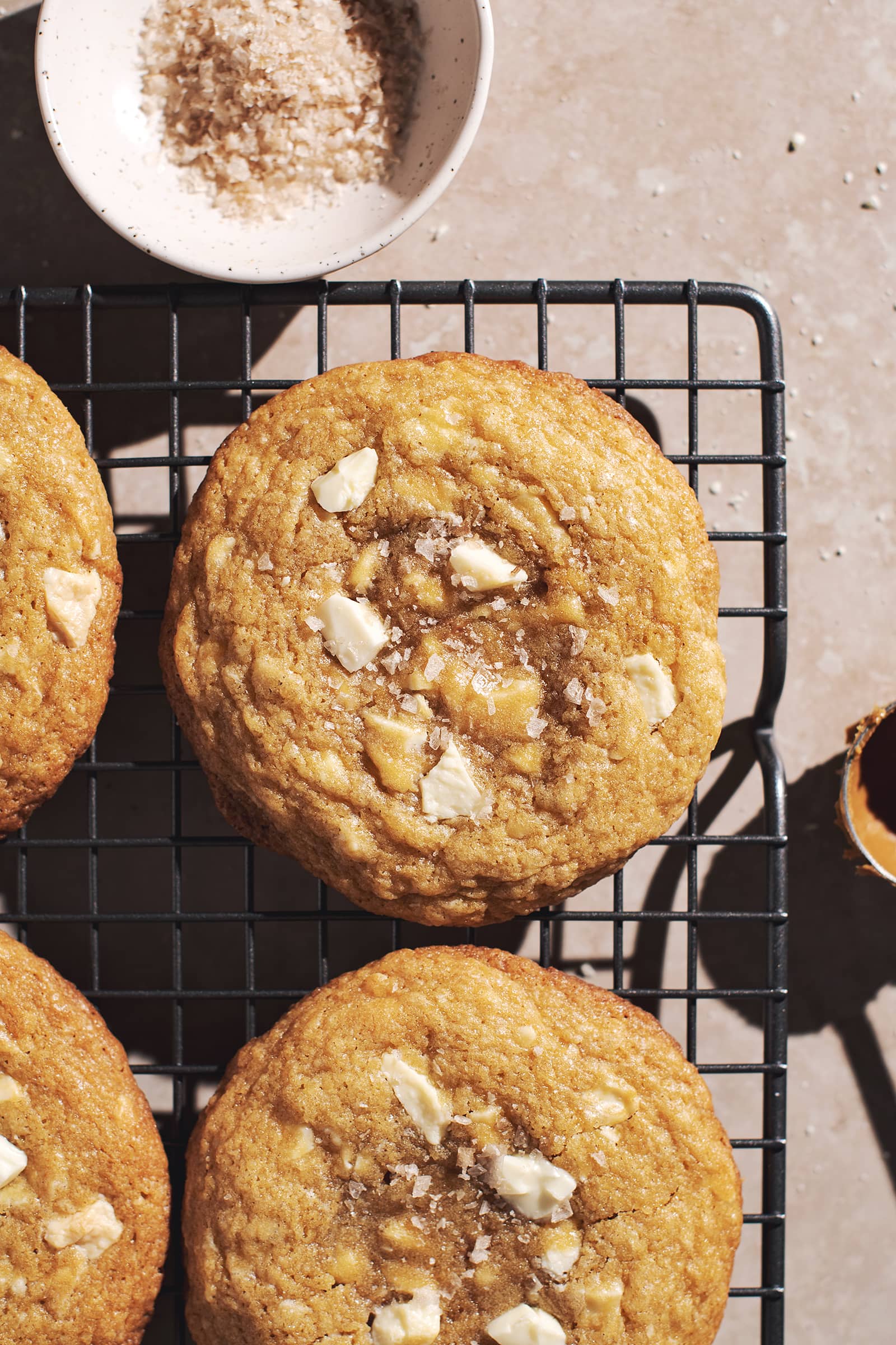 Biscoff stuffed cookies on a wire rack.