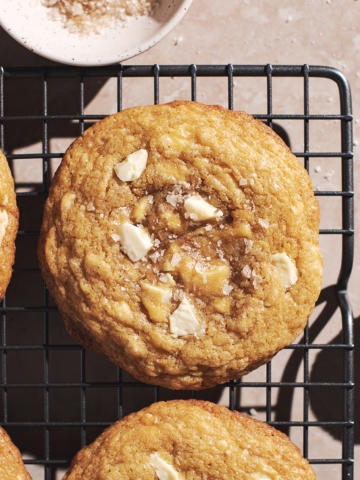 Biscoff stuffed cookie on a wire rack.