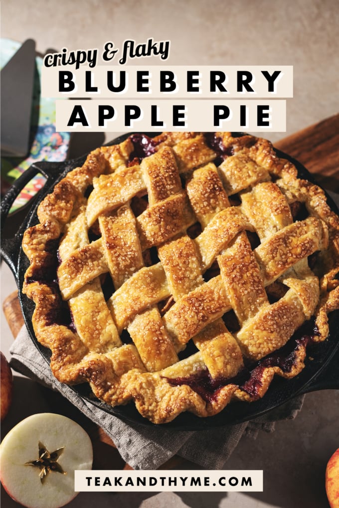 A lattice apple pie on a plate with a text overlay that says โcrispy & flaky blueberry apple pieโ.
