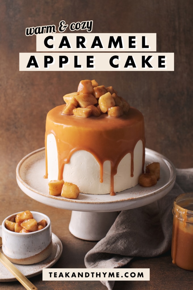 Caramel apple cake with caramel drips on cake stand.
