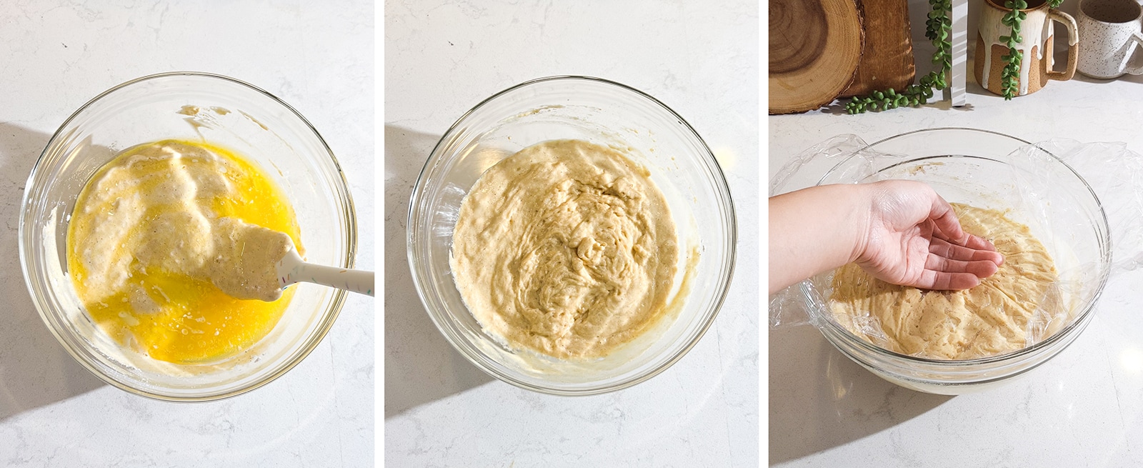 Folding melted butter into batter and covering with plastic wrap.