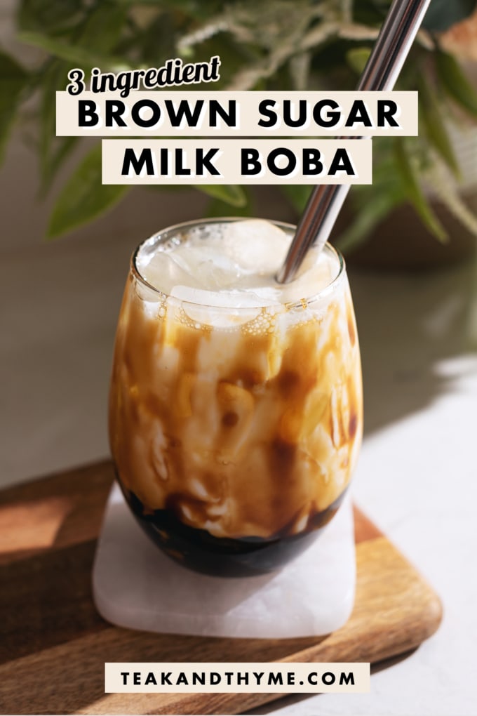 Glass drizzled with brown sugar syrup and filled with milk and boba.