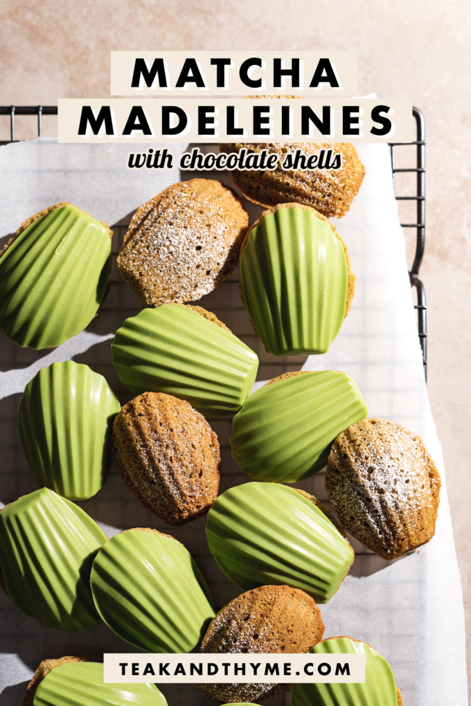 Matcha madeleines with a shiny matcha shell scattered on a wire rack.
