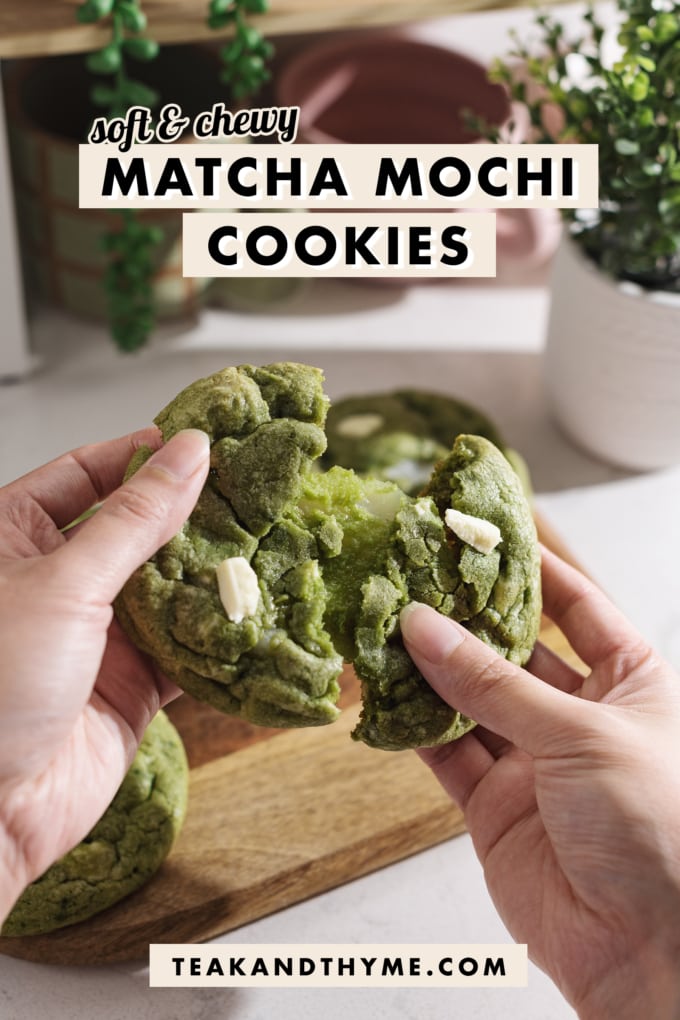 Pulling a matcha mochi cookie apart to show the stretchy mochi inside.