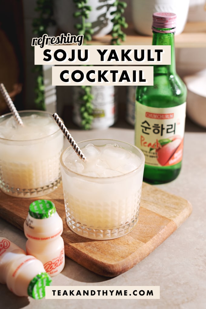 Soju yakult cocktail in a glass with soju bottle in the background and yakult in the foreground.