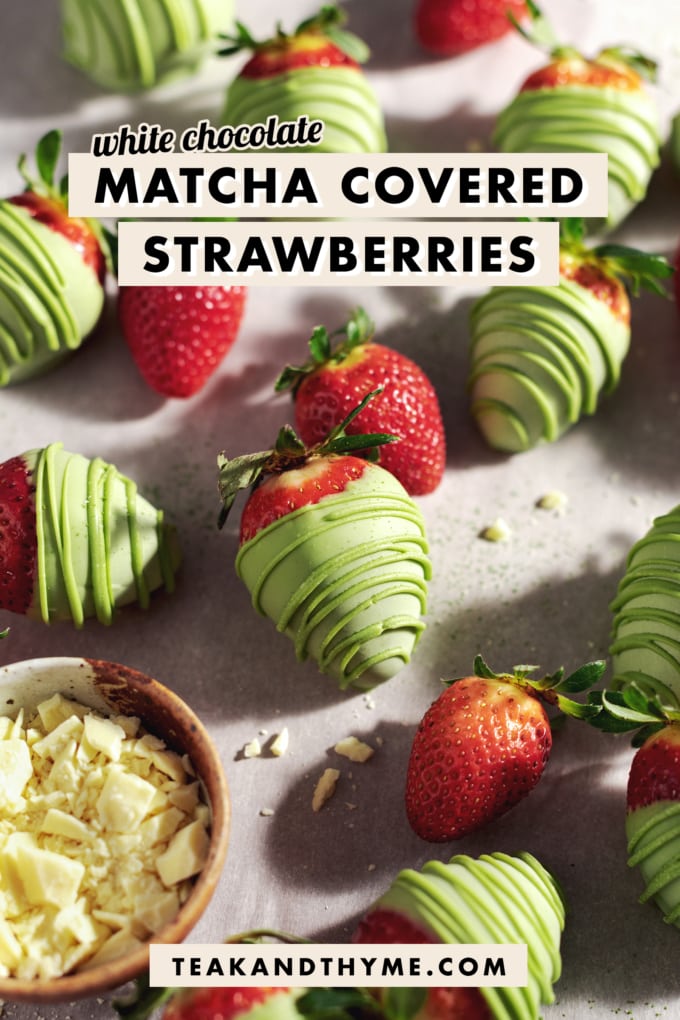 Strawberries dipped in green matcha white chocolate scattered on table with fresh strawberries.