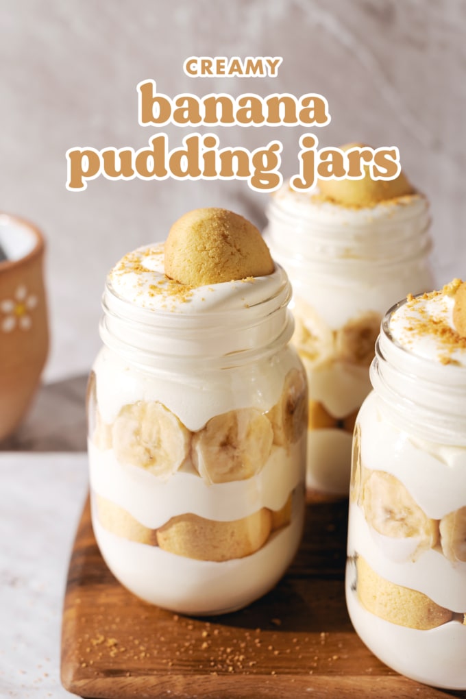Glass jar showing layers of vanilla pudding, wafers, and banana slices.