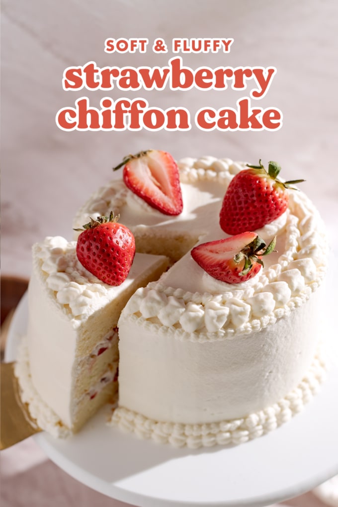 Strawberry chiffon cake with a slice cut out of it.
