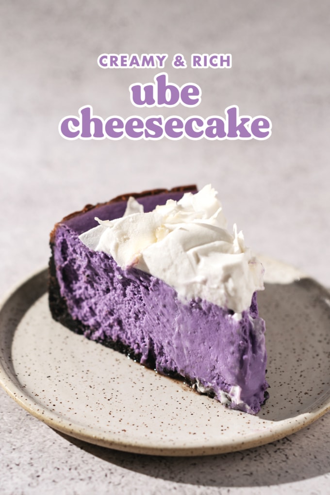 A single slice of ube cheesecake on a plate.