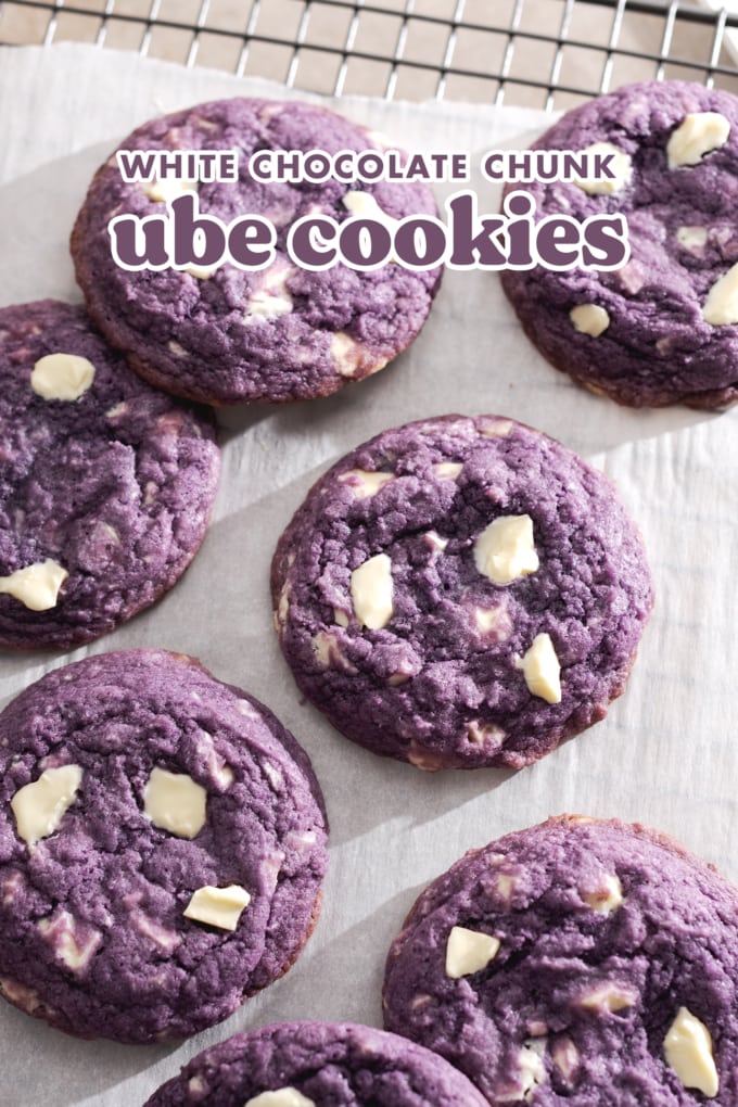 Several ube cookies scattered on a wire rack.