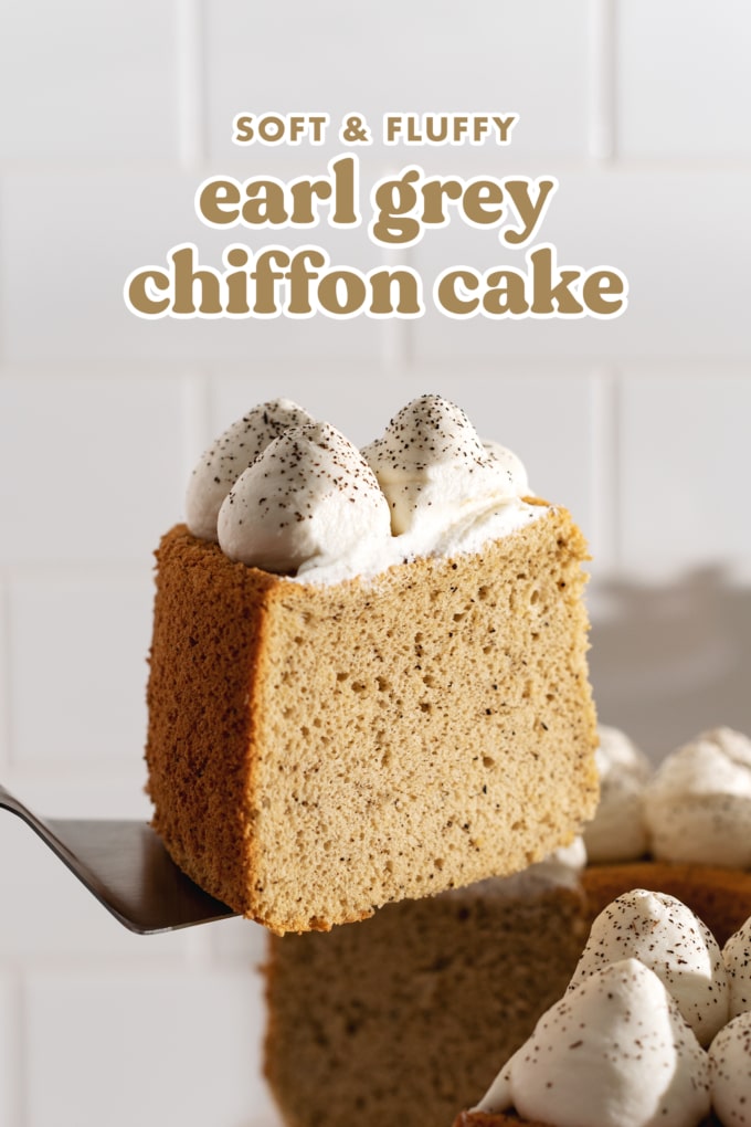 Holding a slice of cake on a cake server.