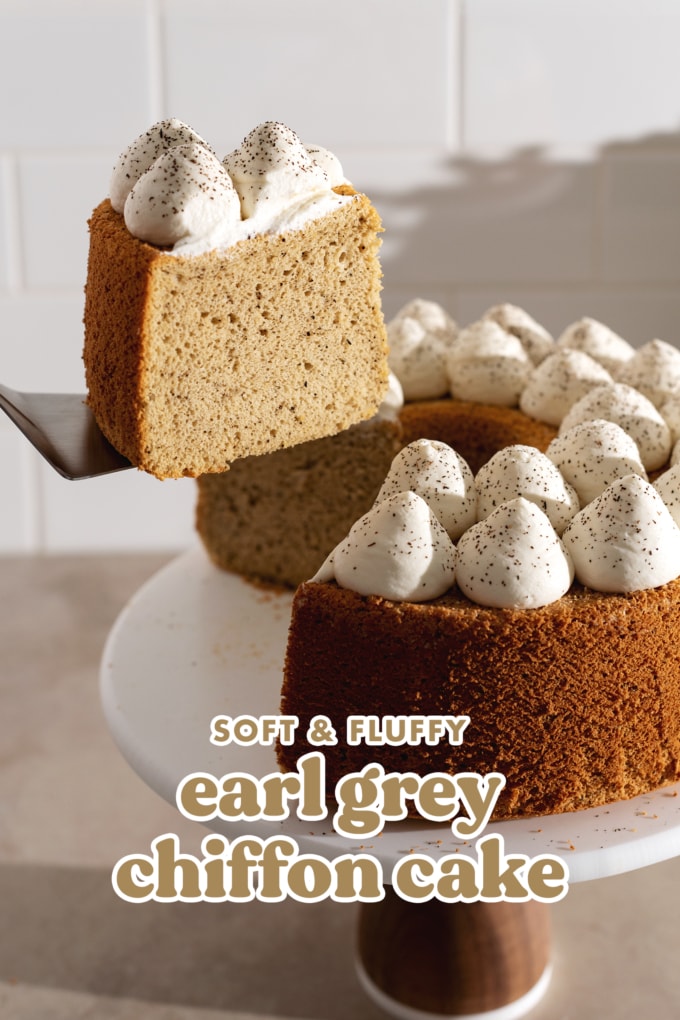 Lifting a slice of earl grey chiffon cake from the rest of the cake on a cake stand.