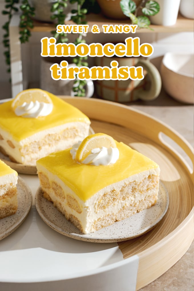 Square slices of limoncello tiramisu on a round tray with layers of ladyfingers, mascarpone, and lemon curd.