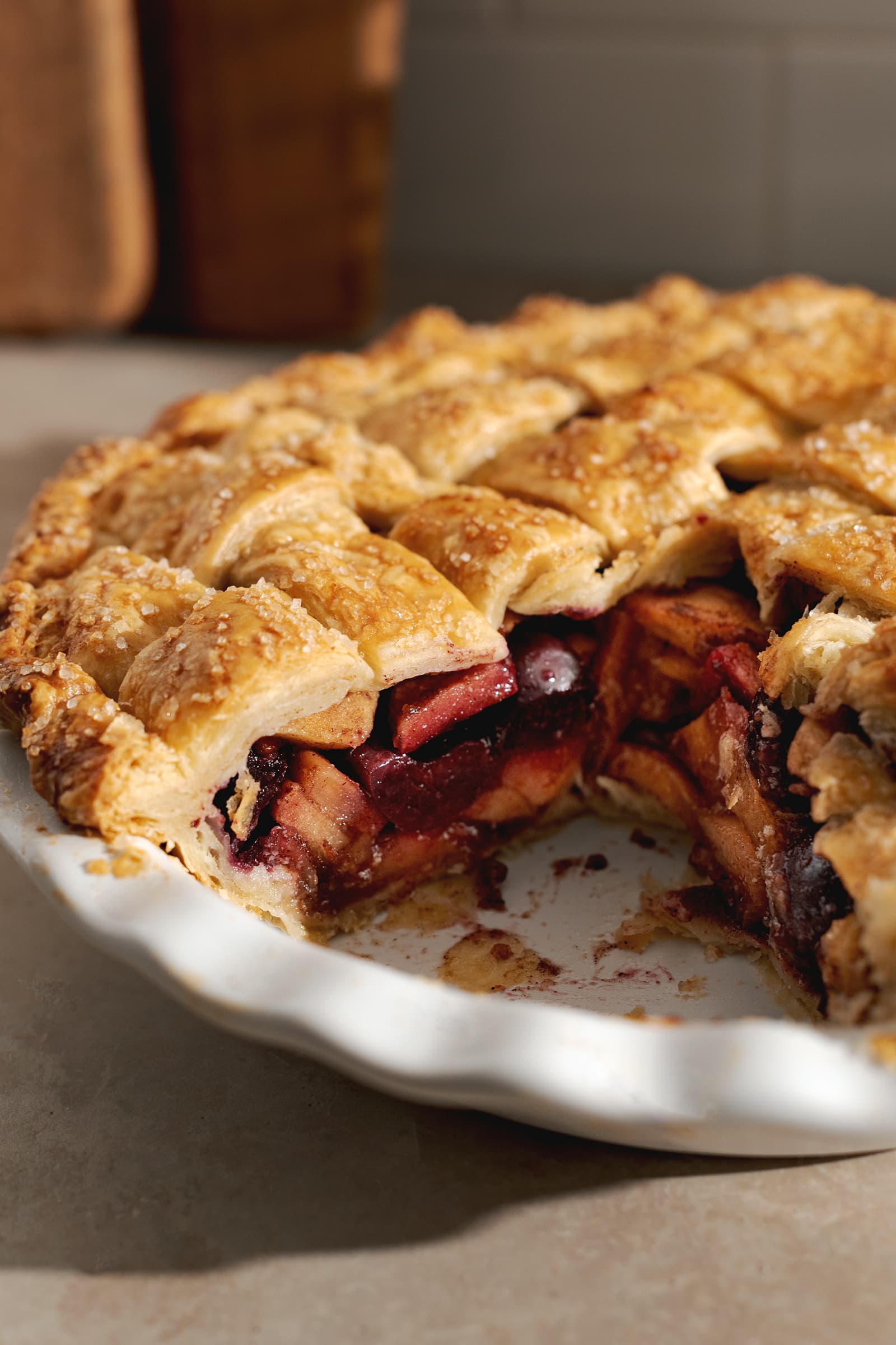 Cross section of the cherry and apple filling inside a pie.