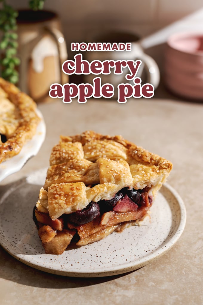 A slice of cherry apple pie on a plate.
