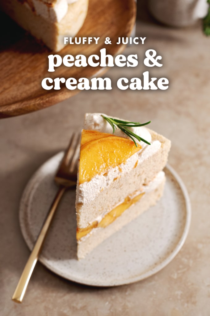 A slice of peaches and cream cake on a plate with a fork next to it.