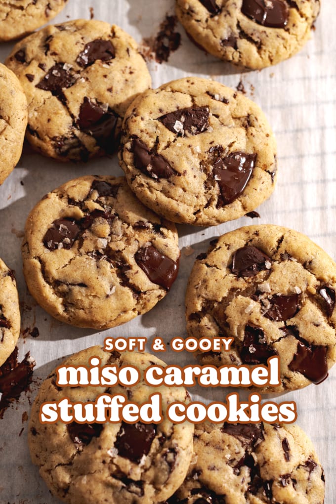 Miso cookies scattered on parchment paper.