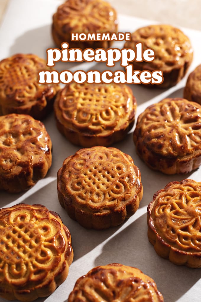 Several baked mooncakes scattered on counter.