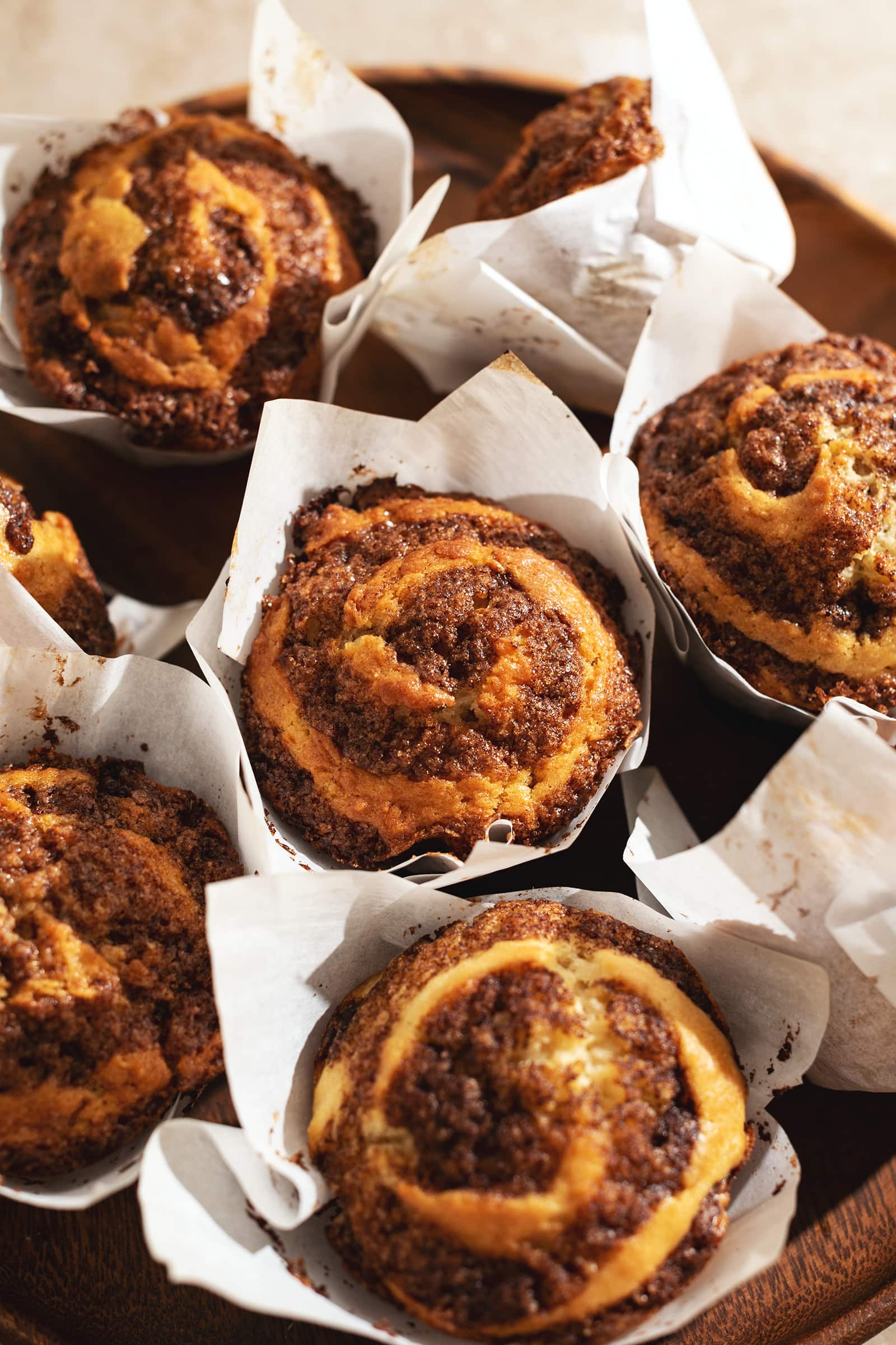 Close-up of the cinnamon swirl on top of cinnamon roll muffins.