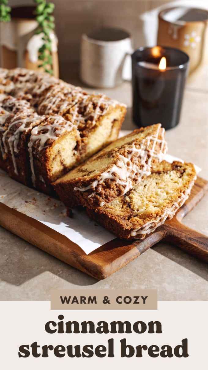 Slices of cinnamon streusel cake on a wooden platter.